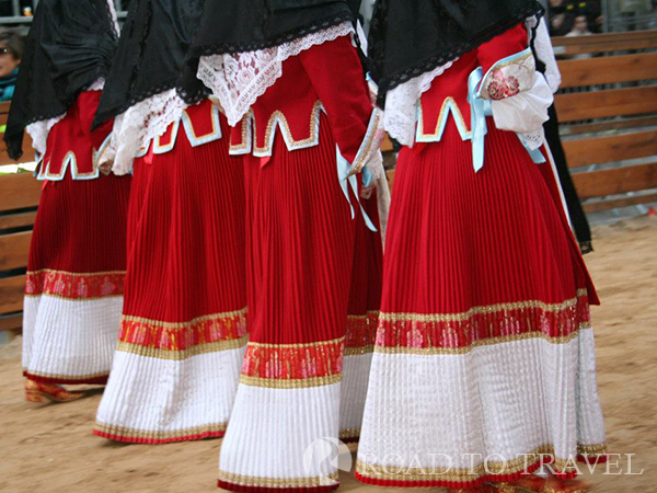 Sa Sartiglia - Oristano Typical coloured dresses with Spanish origins during the historical parade that precedes the Sartiglia race in Oristano.