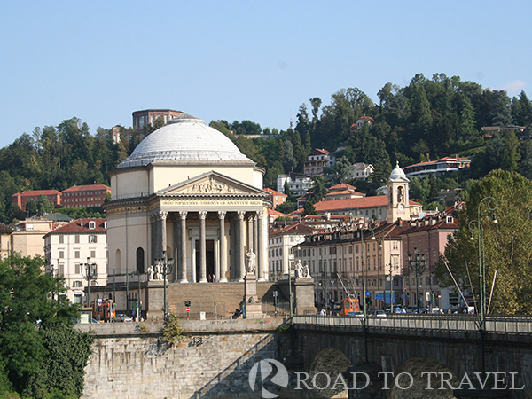 La Gran Madre La Gran Madre is one of the most important churches of Turin. It was built in 1814 to celebrate the return of the <br/>Savoy family in the kingdom of Piedmont. The church, is located near the banks of the river Po, and it is one <br/>of the places to visit in your Turin tour.